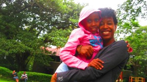 Teresia would often come up behind me, slip her arms around me, and press her face close.