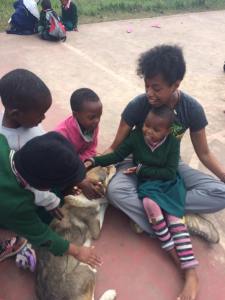 Agnes, Robert, Mansuma and Lawrence decide they can trust the dog if her head is on my lap.